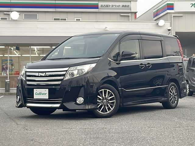 トヨタ ノア Si サイドリフトアップ 愛知県 2015(平27)年 4.5万km ブラック /禁煙/ディーラー整備記録簿H30//メモリナビ/フルセグ/CD/DVD/BT/USB//助手席サイドリフトアップ//バックカメラ//革巻きステア/ステアスイッチ//純正16インチAW//純正フロアマット//純正ドアバイザー//プッシュスタート/スマートキー//サンシェード（セカンドシート）//右側パワースライドドア//アイドリングストップ//横滑り防止装置//HIDヘッドライト//オートライト//電格ミラー//新車時保証書//取扱説明書//スペアキー
