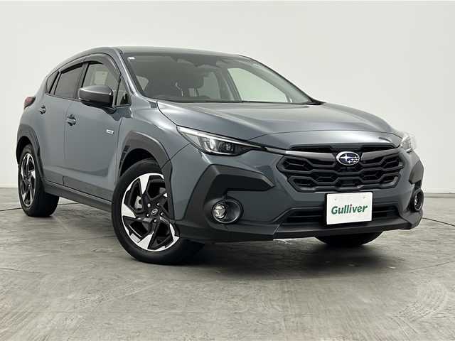 スバル クロストレック リミテッド 三重県 2023(令5)年 1.8万km 青 禁煙車/アイサイト コアテクノロジー/［プリクラッシュブレーキ/前側方プリクラッシュブレーキ/緊急時プリクラッシュステアリング/後退時ブレーキアシスト/AT誤発進抑制制御/ AT誤後進抑制制御/ツーリングアシスト/全車速追従機能付クルーズコントロール/定速クルーズコントロール/車線逸脱抑制/車線逸脱警報/ふらつき警報/先行車発進お知らせ機能/青信号お知らせ機能］/運転支援テクノロジー［スバルリヤビークルディテクション（後側方警戒支援システム）/エマージェンシーレーンキープアシスト/ドライバー異常時対応システム］/純正ナビ/ AppleCarPlay/AndroidAuto/フルセグTV/USB/デジタルマルチビューモニター/ETC/シートヒーター/パワーシート/ステアリングヒーター/パドルシフト/オートライト/LEDヘッドライト/ステアリングスイッチ/革巻きステアリング