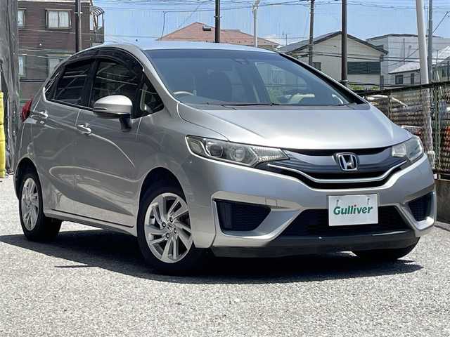 ホンダ フィット 13G Fパッケージ 千葉県 2015(平27)年 3.6万km アラバスターシルバーメタリック シティブレーキアクティブシステム/純正SDナビゲーション/（CD/DVD/SD/BT/ワンセグTV）/バックカメラ/ETC/アイドリングストップ/ステアリングスイッチ/キセノンライト/オートライト/ドアバイザー/電格ミラー/純正フロアマット/純正15インチアルミホイール