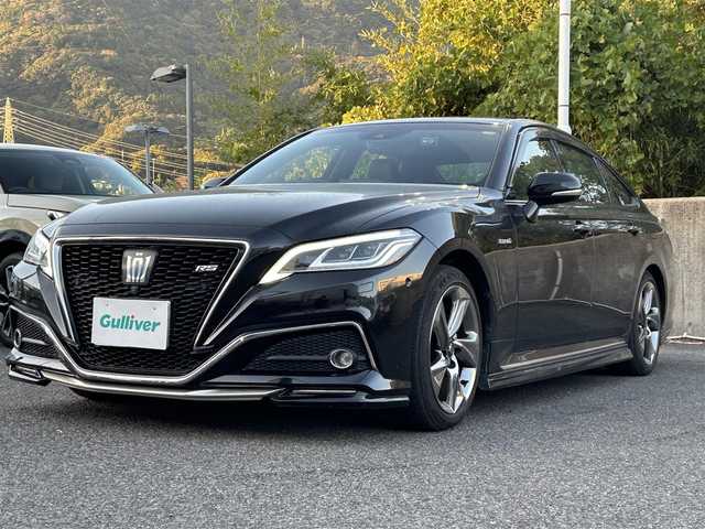 トヨタ クラウン ハイブリッド RS アドバンス 長崎県 2019(令1)年 5.7万km プレシャスブラックパール ワンオーナー/メーカーナビ（フルセグ、CD、DVD、AM、FM、BT）/プッシュスタート/電格ウィンカーミラー/BSM/レーダークルーズコントロール/ステアリングリモコン/パドルシフト/オートライト/オートハイビーム/パーキングアシスト/バックカメラ/サイドカメラ/フロントカメラ/全周囲カメラ/電動サイドブレーキ/オートホールド/前後ドラレコ/ハーフレザーシート/DN席パワーシート/D席シートメモリー/DN席シートヒーター/ステアリングヒーター/電動チルトステアリング/革巻きステアリング/純正フロアマット/衝突軽減システム/純正AW/ドアバイザー/スペアキー/保証書/取説