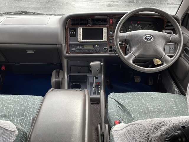 トヨタ ハイエース リビングサルーン EX 静岡県 2002(平14)年 7.4万km ホワイトパールマイカ/ベージュマイカ /ワンオーナー//純正DVDナビ/社外地デジTV//CD/DVD//バックカメラ//サンルーフ//スライドドア//ETC//キーレス//スペアキー//保証書//取説
