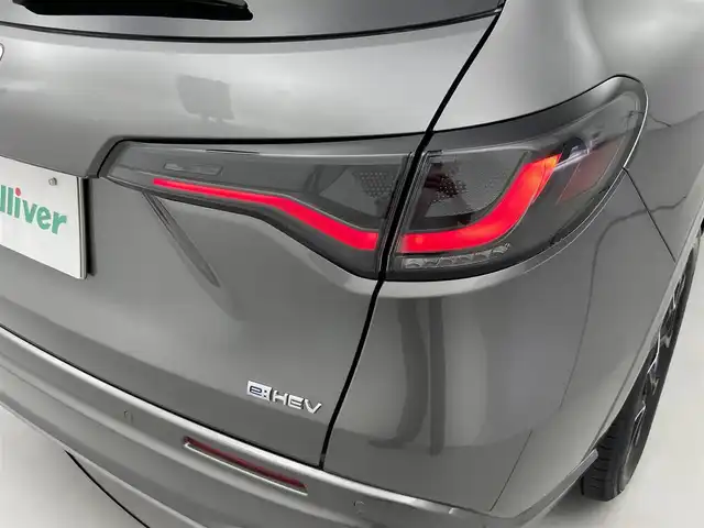 ホンダ ＺＲ－Ｖ ハイブリッド e:HEV Z 福井県 2022(令4)年 2.6万km スーパープラチナグレーメタリック ９インチHonda CONNECTナビ/フルセグTV/Bluetooth/AppleCarPlay/USB/AM/FM/マルチビューカメラシステム/ビルトイン2.0ETC/純正ドライブレコーダー/Honda SENSING/・衝突軽減ブレーキ/・誤発進抑制機能/・後方誤発進抑制機能/・歩行者事故低減ステアリング/・路外逸脱抑制機能/車線維持支援システム/・アダプティブクルーズコントロール/・標識認識機能/・先行車発進お知らせ機能/・オートハイビーム/・ブラインドスポットモニター/プッシュスタート /スペアキー/フルLEDヘッドライト（オートライト）/LEDアクティブコーナリングライト/BOSEプレミアムサウンドシステム/シートヒーター /ステアリングヒーター/ステアリングリモコン/パドルシフト/パワーバックドア/ワイヤレス充電器