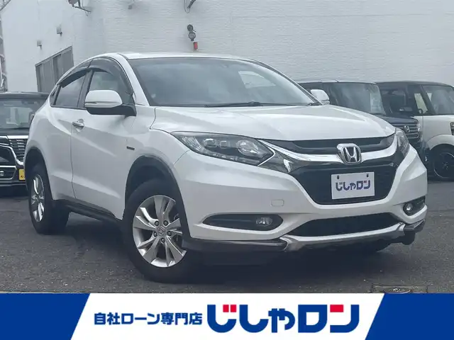ホンダ ヴェゼル ハイブリッド X 福岡県 2014(平26)年 11.1万km ホワイトオーキッドパール (株)IDOMが運営する【じしゃロン八幡西店】の自社ローン専用車両になります。こちらは現金またはオートローンご利用時の価格です。自社ローンご希望の方は別途その旨お申付け下さい/ホンダ純正インターナビ（30T7A800）/・BLUETOOTH/・ワンセグTV/・CD/・DVD/ビルトインETC/ドライブレコーダー/衝撃被害軽減ブレーキ/クルーズコントロール/横滑り防止機能/プッシュスタート/ドアバイザー/ISOFIX