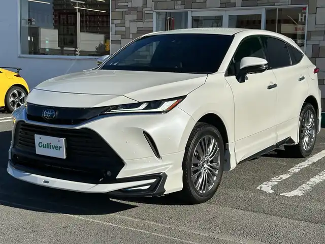 トヨタ ハリアー ハイブリッド Z レザーパッケージ 徳島県 2021(令3)年 4.3万km ホワイトパールクリスタルシャイン 純正12.3インチディスプレイオーディオナビ/（Bluetooth/フルセグTV）/アラウンドビューモニター/JBLプレミアムサウンドシステム/本革シート/モデリスタエアロ/トヨタセーフティセンス/レーダークルーズコントロール/シートヒーター（D＋N席）/シートベンチレーション（D＋N席）/パワーシート（D＋N席）/メモリーシート（D席）/ステアリングヒーター/オートハイビーム/LEDヘッドライト/スペアキー