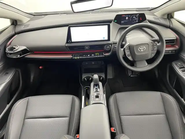 トヨタ プリウス Z 岡山県 2024(令6)年 0.6万km アティチュードブラックマイカ 純正12.3インチデイスプレイオーディオ/マルチビューカメラ/モデリスタエアロ（フロント）/黒革シート/前席ベンチレーション/D席シートメモリー/ステアリングヒーター/デジタルインナーミラー/ワイヤレス充電/7インチマルチディスプレイ/スペアキー/純正フロアマット/純正ドアバイザー