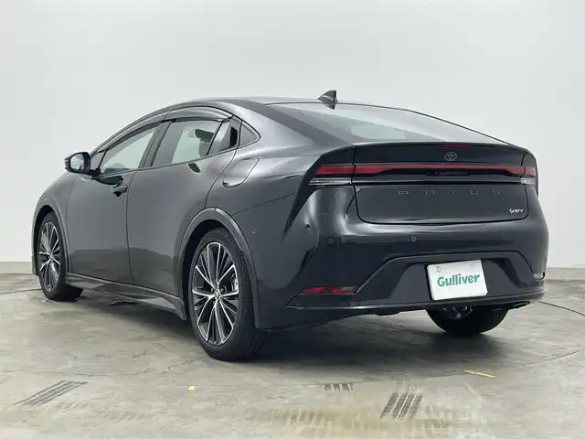 トヨタ プリウス Z 岡山県 2024(令6)年 0.6万km アティチュードブラックマイカ 純正12.3インチデイスプレイオーディオ/マルチビューカメラ/モデリスタエアロ（フロント）/黒革シート/前席ベンチレーション/D席シートメモリー/ステアリングヒーター/デジタルインナーミラー/ワイヤレス充電/7インチマルチディスプレイ/スペアキー/純正フロアマット/純正ドアバイザー