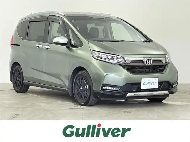 ホンダ フリード＋ ハイブリット クロスター ホンダセンシング 千葉県 2020(令2)年 5.6万km シルバーミストグリーンM ホンダセンシング（安全運転支援システム）/・衝突軽減ブレーキ〈CMBS〉/・誤発進抑制機能/・歩行者事故低減ステアリング/・路外逸脱抑制機能/・渋滞追従機能付 ACC/〈アダプティブ・クルーズ・コントロール〉/・LKAS〈車線維持支援システム〉/・先行車発進お知らせ機能/・標識認識機能/純正7インチメモリーナビ/・Bluetooth接続/バックカメラ/両側パワースライドドア/前後コーナーセンサー/LEDヘッドライト/ハーフレザーシート/スマートキー/純正ビルトインETC/サイド/カーテンエアバッグ