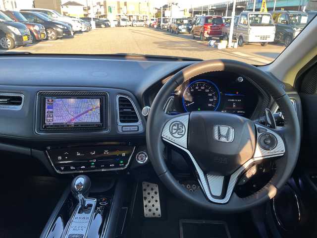 ホンダ ヴェゼル ハイブリッド X 石川県 2014(平26)年 8.8万km シルバー ４ＷＤ　社外メモリーナビ　フルセグＴＶ　社外マフラー　安心パッケージ　クルーズコントロール　スマートキー　プッシュスタート　シートカバー　コンフォートビュー　シートヒーター　オートライト