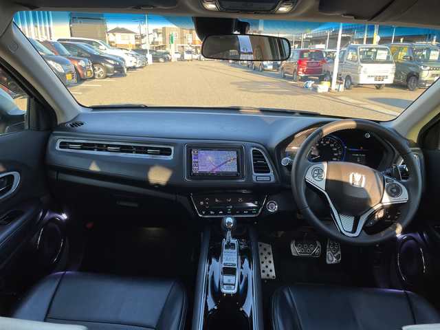 ホンダ ヴェゼル ハイブリッド X 石川県 2014(平26)年 8.8万km シルバー ４ＷＤ　社外メモリーナビ　フルセグＴＶ　社外マフラー　安心パッケージ　クルーズコントロール　スマートキー　プッシュスタート　シートカバー　コンフォートビュー　シートヒーター　オートライト