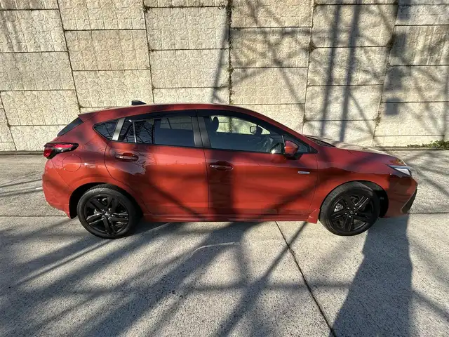 スバル インプレッサ ST－G 長崎県 2024(令6)年 0.4万km オレンジ ワンオーナー/11.6インチセンターインフォメーションディスプレイ/（BT/フルセグ）/全方位カメラ/衝突軽減システム/レーンアシスト/ブラインドスポットモニター/レーダークルーズ/ETC/パドルシフト/オートライト/ステアリングスイッチ/純正17インチAW/AppleCarplay・AndroidAuto/AUX/USB/Cタイプ/カラーコード：XAX