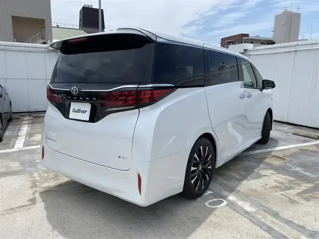 トヨタ アルファードハイブリット エグゼクティブ ラウンジ 広島県 2025(令7)年 0.1万km未満 プラチナホワイトパールマイカ ワンオーナー/トヨタチームメイト/ベージュプレミアムナッパ革シート/左右独立ムーンルーフ/純正OP:19インチアルミホイール/JBLプレミアムサウンドシステム/14インチリアエンターテイメント/14インチディスプレイオーディオプラス/エグゼクティブラウンジシート/デジタルインナーミラー/カラーヘッドアップディスプレイ/パノラミックビューカメラ/フルセグTV・スマートキー/保証書あり/取り扱い説明書あり/スペア（スマートキー）あり
