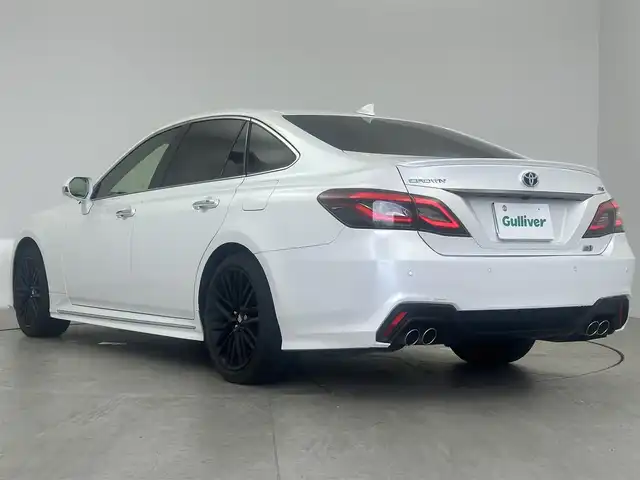 トヨタ クラウン ハイブリッド RS リミテッドⅡ 愛知県 2021(令3)年 6.4万km プレシャスホワイトパール ワンオーナー/220クラウン後期型/寒冷地仕様/RSlimited2特別仕様車/　　・3眼ヘッドライト/　　・LEDクリアランスランプ/　　・LEDシーケンシャルランプ/　　・フロントフォグランプリング/　　・漆黒メッキモール付フロントグリル＆バンパー/　　・スモークメッキラゲージガーニッシュ/　　・専用18インチマットブラック塗装アルミホイール/　　・本革シート/　　・前席シートベンチレーション/　　・メタル調センターコンソール/　　・ドアトリム（ダークグレー）/　　・スマートキー（専用ガンメタリックカラー）/　　・イージークローザー（全ドア）/　　・ディーラーオプションフロアマット/ドライブレコーダー（前方）/HUD/純正コネクテッドナビ付ディスプレイオーディオ/　　・CD/DVD/BT/フルセグTV/パノラミックビューモニター/ビルトインETC2.0/TRDプッシュボタン/ステアリングリモコン/ステアリングヒーター/パワーシート（前席）/シートヒーター（前席）/電動式リヤサンシェード/BSM/トヨタセーフティセンス/インテリジェントクリアランスソナー/取扱説明書/保証書