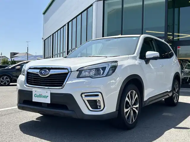 スバル フォレスター プレミアム 愛媛県 2019(令1)年 4.8万km クリスタルホワイトP 登録時走行距離：47972km/純正メーカーオプションナビ/CD/DVD/TV/Bluetooth/バックサイドフロントカメラ/純正前部ドライブレコーダー/ＥＴＣ/衝突軽減システム/横滑り防止装置/レーンキープアシスト/レーダークルーズコントロール/前席パワーシート/全席シートヒーター/ハンドルヒーター/Ｗサイドエアバッグ/ＬＥＤヘッドライト/ＬＥＤフォグライト/オートライト/エンジンスタートボタン/スマートキー/純正フロアマット