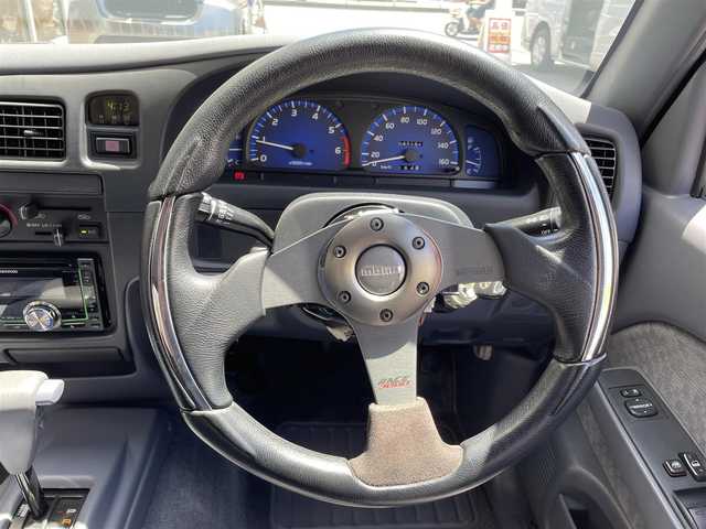 トヨタ ハイラックス スポーツピック エクストラキャブ 東京都 2001(平13)年 4.8万km シャンパンマイカM サンルーフ/社外CDオーディオ/社外16インチアルミホイール/メッキドアミラー/ファブリックスポーツシート/シートバックポケット/ETC/メッキリアバンパー/メッキフロントバンパー/プライバシーガラス/純正ハンドル/純正15インチタイヤ有/純正マフラー有/純正フロアマット/取扱説明書