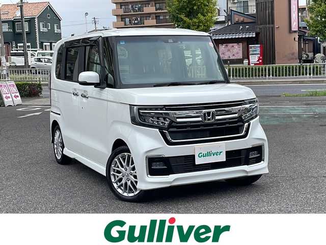 ホンダ Ｎ ＢＯＸ カスタム L ターボ 愛知県 2022(令4)年 2.6万km プラチナホワイトパール /純正ナビ//バックカメラ//フルセグTV・Bluetooth・CD・DVD・AM・FM・AUX//前後ドライブレコーダー//両側パワースライドドア//前席シートヒーター//ハーフレザーシート//アダプティブクルーズコントロール//電子パーキング//オートブレーキホールド//ETC2.0//オートリトラクトミラー//チップアップ＆ダイブダウン機構付スライドリアシート//革巻きステアリング//ステアリングスイッチ//パドルシフト//パーキングセンサーシステム//コンビニフック付きシートバックテーブル//純正フロアマット//保証書・取扱説明書・スペアキー有//ホンダセンシング/・衝突軽減ブレーキ/・誤発進抑制機能/・歩行者事故低減ステアリング/・路外逸脱抑制機能/・車線維持支援システム/・先行車発進お知らせ機能/・標識認識機能/・後方誤発進抑制機能