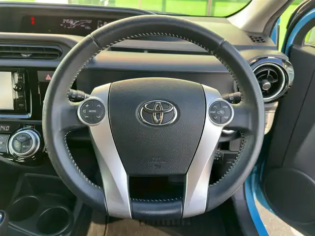 トヨタ アクア G 和歌山県 2015(平27)年 8.5万km クールソーダメタリック 純正7インチナビ/フルセグTV/Bluetooth/CD/DVD/SD/バックカメラ/ETC/クルーズコントロール/革巻きステアリング/ステアリングスイッチ/HIDヘッドライト/フォグランプ/オートライト/ヘッドライトレベライザー/フルオートエアコン/電動格納ミラー/コーナーポール/プッシュスタート/スマートキー/スペアキー