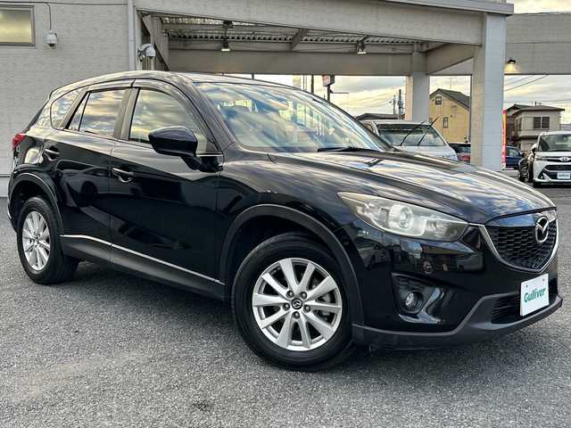 マツダ ＣＸ－５ XD 埼玉県 2013(平25)年 13.4万km ジェットブラックマイカ ・社外ナビBT、フルセグTV、/・バックカメラ/・プッシュスタート/・ETC/・空気圧センサー/・トラクションコントロール/・アイドリングストップ/・純正フロアマット/・ステアリングスイッチ/【メーカーオプション】/・ディスチャージパッケージ/ディスチャージパッケージの内容/ディスチャージヘッドランプ（ハイ／ロービーム：オートレベリング［光軸調整］機構付／バイキセノン）＋アダプティブ・フロントライティング・システム＋オートライトシステム＋レインセンサーワイパ―（フロント）感度調整式