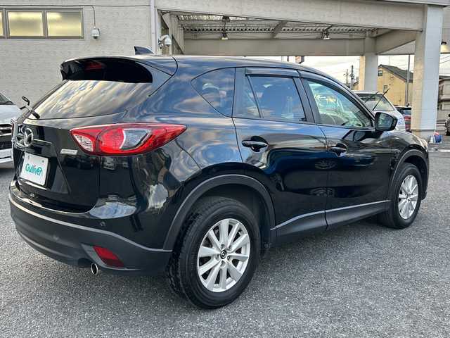 マツダ ＣＸ－５ XD 埼玉県 2013(平25)年 13.4万km ジェットブラックマイカ ・社外ナビBT、フルセグTV、/・バックカメラ/・プッシュスタート/・ETC/・空気圧センサー/・トラクションコントロール/・アイドリングストップ/・純正フロアマット/・ステアリングスイッチ/【メーカーオプション】/・ディスチャージパッケージ/ディスチャージパッケージの内容/ディスチャージヘッドランプ（ハイ／ロービーム：オートレベリング［光軸調整］機構付／バイキセノン）＋アダプティブ・フロントライティング・システム＋オートライトシステム＋レインセンサーワイパ―（フロント）感度調整式