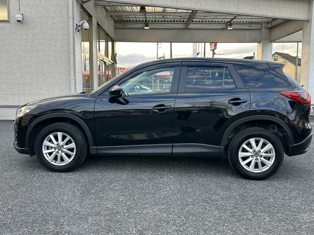 マツダ ＣＸ－５ XD 埼玉県 2013(平25)年 13.4万km ジェットブラックマイカ ・社外ナビBT、フルセグTV、/・バックカメラ/・プッシュスタート/・ETC/・空気圧センサー/・トラクションコントロール/・アイドリングストップ/・純正フロアマット/・ステアリングスイッチ/【メーカーオプション】/・ディスチャージパッケージ/ディスチャージパッケージの内容/ディスチャージヘッドランプ（ハイ／ロービーム：オートレベリング［光軸調整］機構付／バイキセノン）＋アダプティブ・フロントライティング・システム＋オートライトシステム＋レインセンサーワイパ―（フロント）感度調整式