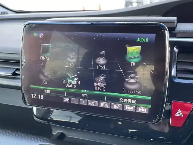 ホンダ ステップワゴン 東京都 2019(令1)年 10.4万km プラチナホワイトパール ユーザー買取車/社外ナビ【パナソニック　ストラーダ】/・AM/FM/SD/BT/TV/両側パワスラ/ホンダセンシング/・ACC（アダプティブクルーズコントロール）/・CMBS（追突軽減ブレーキ）/・LKAS（車線維持支援システム）/・誤発進抑制機能/・路外逸脱抑制機能/・先行車発信お知らせ機能/・標識認識機能/シートヒーター/パドルシフト/ビルトインＥＴＣ/ＥＣＯＮ/トリプルゾーンコントロール・フルオートエアコン/LEDヘッドライト（オートレベリング/オートライトコントロール機能）/スポーツペダル/純正フロアマット/ドアバイザー/プッシュスタート