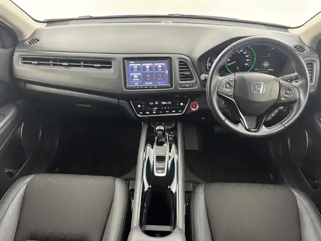 ホンダ ヴェゼル ハイブリッド Z ホンダセンシング 福井県 2019(令1)年 5万km プラチナホワイトパール 純正メモリナビ【VXM-195VFEi】/CD/DVD/フルセグTV/Bluetooth/USB/AM/FM/バックカメラ /Honda SENSING/・衝突軽減ブレーキ (CMBS)/・路外逸脱抑制機能/・歩行者事故低減ステアリング/・誤発進抑制機能/・先行車追従機能/・路外逸脱警報/・標識認識機能/アダプティブクルーズコントロール/リバース連動ドアミラー/自動防眩ルームミラー/雨滴検知式フロントワイパー/ハーフレザーシート/シートヒーター /オートライト /LED/フォグランプ/純正ビルトインETC/革巻きステアリング/パドルシフト/ステアリングリモコン/ステアリングチルド機構/ワイパーデアイサー/ルーフレール/純正１７インチアルミ/純正フロアマット
