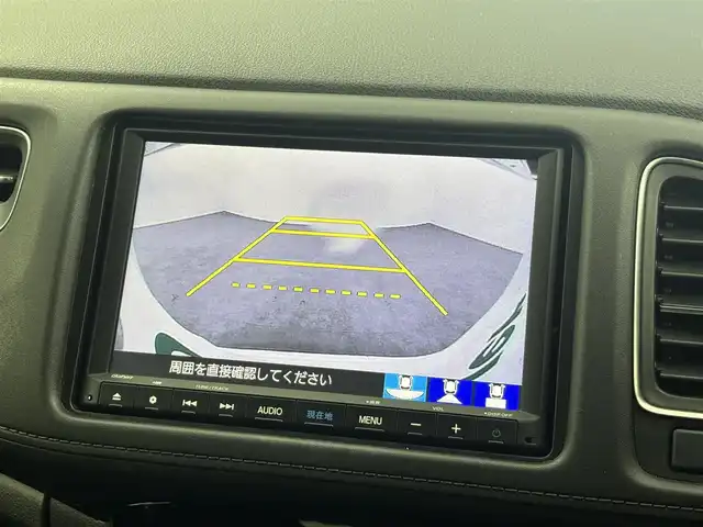 ホンダ ヴェゼル ハイブリッド Z ホンダセンシング 福井県 2019(令1)年 5万km プラチナホワイトパール 純正メモリナビ【VXM-195VFEi】/CD/DVD/フルセグTV/Bluetooth/USB/AM/FM/バックカメラ /Honda SENSING/・衝突軽減ブレーキ (CMBS)/・路外逸脱抑制機能/・歩行者事故低減ステアリング/・誤発進抑制機能/・先行車追従機能/・路外逸脱警報/・標識認識機能/アダプティブクルーズコントロール/リバース連動ドアミラー/自動防眩ルームミラー/雨滴検知式フロントワイパー/ハーフレザーシート/シートヒーター /オートライト /LED/フォグランプ/純正ビルトインETC/革巻きステアリング/パドルシフト/ステアリングリモコン/ステアリングチルド機構/ワイパーデアイサー/ルーフレール/純正１７インチアルミ/純正フロアマット