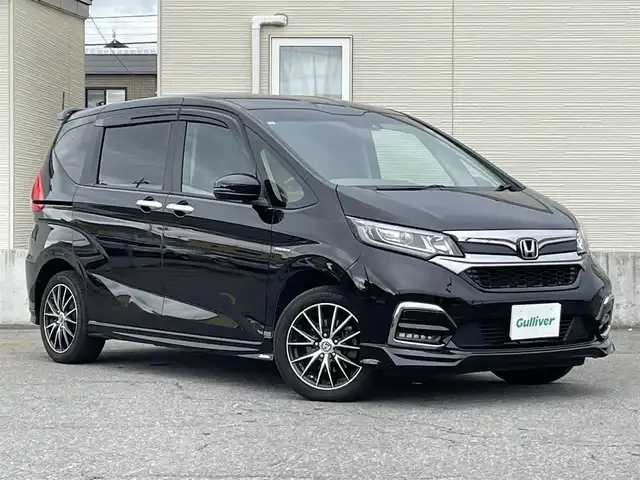 ホンダ フリード ハイブリット G ホンダセンシング 青森県 2019(令1)年 5.4万km クリスタルブラックパール ワンオーナー/Gathers製メモリーナビ/　CD、DVD、BT、HDIM/フルセグTV/前席シートヒーター/両側パワースライドドア/ETC/LEDヘッドライト/フォグランプ/モデューロ製エアロ（F/S/R/RA)/社外センターコンソールBOX/社外AW冬タイヤ車載/シートカバー/クルーズコントロール/保証書/説明書/スペアキー×１本