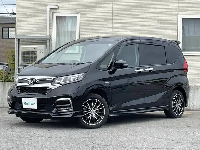 ホンダ フリード ハイブリット G ホンダセンシング 青森県 2019(令1)年 5.4万km クリスタルブラックパール ワンオーナー/Gathers製メモリーナビ/　CD、DVD、BT、HDIM/フルセグTV/前席シートヒーター/両側パワースライドドア/ETC/LEDヘッドライト/フォグランプ/モデューロ製エアロ（F/S/R/RA)/社外センターコンソールBOX/社外AW冬タイヤ車載/シートカバー/クルーズコントロール/保証書/説明書/スペアキー×１本