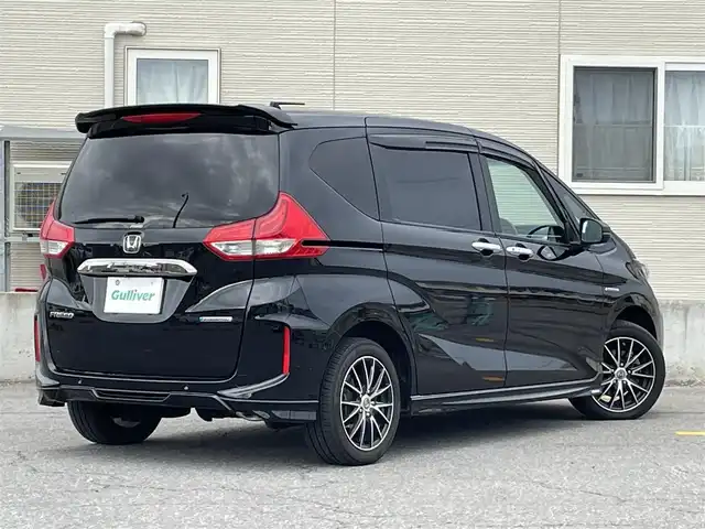 ホンダ フリード ハイブリット G ホンダセンシング 青森県 2019(令1)年 5.4万km クリスタルブラックパール ワンオーナー/Gathers製メモリーナビ/　CD、DVD、BT、HDIM/フルセグTV/前席シートヒーター/両側パワースライドドア/ETC/LEDヘッドライト/フォグランプ/モデューロ製エアロ（F/S/R/RA)/社外センターコンソールBOX/社外AW冬タイヤ車載/シートカバー/クルーズコントロール/保証書/説明書/スペアキー×１本