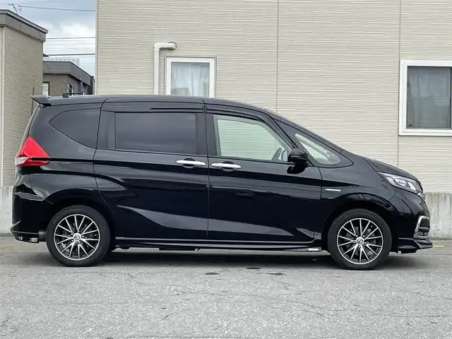 ホンダ フリード ハイブリット G ホンダセンシング 青森県 2019(令1)年 5.4万km クリスタルブラックパール ワンオーナー/Gathers製メモリーナビ/　CD、DVD、BT、HDIM/フルセグTV/前席シートヒーター/両側パワースライドドア/ETC/LEDヘッドライト/フォグランプ/モデューロ製エアロ（F/S/R/RA)/社外センターコンソールBOX/社外AW冬タイヤ車載/シートカバー/クルーズコントロール/保証書/説明書/スペアキー×１本