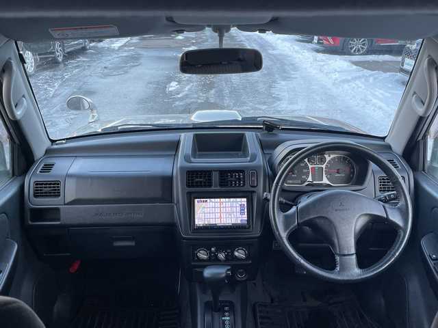 三菱 パジェロ ミニ アクティブフィールドED 道東・釧路十勝 2005(平17)年 8.4万km シンフォニックシルバー 4WD/社外ナビ/・ワンセグ・FM・AM/シートヒーター/アクティブフィールドエディション専用スペアタイヤケース/フォグランプ/ETC