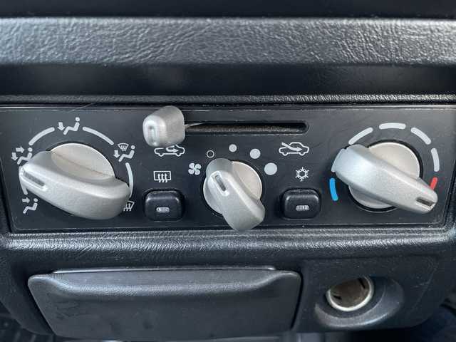 三菱 パジェロ ミニ アクティブフィールドED 道東・釧路十勝 2005(平17)年 8.4万km シンフォニックシルバー 4WD/社外ナビ/・ワンセグ・FM・AM/シートヒーター/アクティブフィールドエディション専用スペアタイヤケース/フォグランプ/ETC