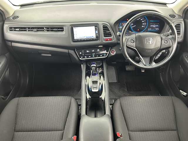 ホンダ ヴェゼル ハイブリッド X 宮城県 2014(平26)年 10.3万km ホワイトオーキッドパール 禁煙車/シティブレーキアクティブシステム/リアクティブフォースペダル/クルーズコントロール/前席シートヒーター/純正7インチナビ/（BT.AM.FM.CD.DVD.SD.USB.Ipod）/バックカメラ/フルセグテレビ/ETC/電動パーキングブレーキ/AUTOHOLD/パドルシフト/革巻きステアリング/ステアリングスイッチ/プッシュスタート/スマートキー/スペアキー/純正フロアマット/ドアバイザー/LEDヘッドライト/フォグランプ/社外16インチアルミホイール/純正16インチアルミホイール付夏タイヤ積込/（215/60/16）/ECON/横滑り防止機能