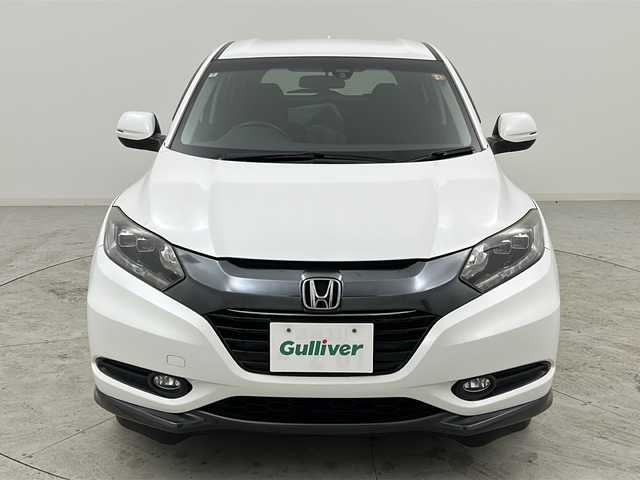 ホンダ ヴェゼル ハイブリッド X 宮城県 2014(平26)年 10.3万km ホワイトオーキッドパール 禁煙車/シティブレーキアクティブシステム/リアクティブフォースペダル/クルーズコントロール/前席シートヒーター/純正7インチナビ/（BT.AM.FM.CD.DVD.SD.USB.Ipod）/バックカメラ/フルセグテレビ/ETC/電動パーキングブレーキ/AUTOHOLD/パドルシフト/革巻きステアリング/ステアリングスイッチ/プッシュスタート/スマートキー/スペアキー/純正フロアマット/ドアバイザー/LEDヘッドライト/フォグランプ/社外16インチアルミホイール/純正16インチアルミホイール付夏タイヤ積込/（215/60/16）/ECON/横滑り防止機能