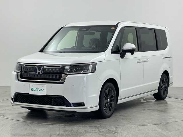 ホンダ ステップワゴン スパーダ eHEV 群馬県 2025(令7)年 0.1万km未満 プラチナホワイトパール 登録済未使用車　純正１１．４型ナビ　バックカメラ　電動リアゲート　両側電動スライドドア　パドルシフト　ＢＳＭ　アダプティブクルーズコントロール　電動パーキングブレーキ　シートヒーター　ＬＥＤ　禁煙車
