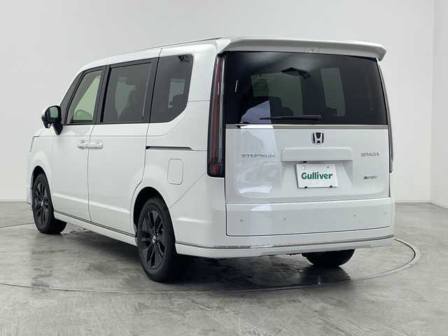 ホンダ ステップワゴン スパーダ eHEV 群馬県 2025(令7)年 0.1万km未満 プラチナホワイトパール 登録済未使用車　純正１１．４型ナビ　バックカメラ　電動リアゲート　両側電動スライドドア　パドルシフト　ＢＳＭ　アダプティブクルーズコントロール　電動パーキングブレーキ　シートヒーター　ＬＥＤ　禁煙車
