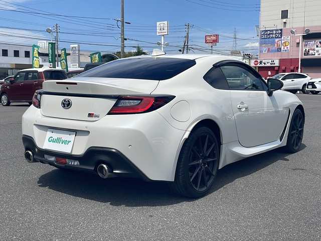 トヨタ ＧＲ８６ RZ 長崎県 2022(令4)年 2.1万km クリスタルホワイトパール ワンオーナー/純正メモリナビ/(CD/DVD/Bluetooth/フルセグTV)/バックカメラ/前後ドライブレコーダー/ETC/社外レーダー/衝突軽減ブレーキ/レーンキープアシスト/レーダークルーズコントロール/コーナーセンサー/ハーフレザーシート/前席シートヒーター/パドルシフト/ステアリングスイッチ/オートライト/LEDヘッドランプ/フォグランプ/プッシュスタート/スマートキー×２/純正アルミホイール/純正フロアマット/取扱説明書/保証書