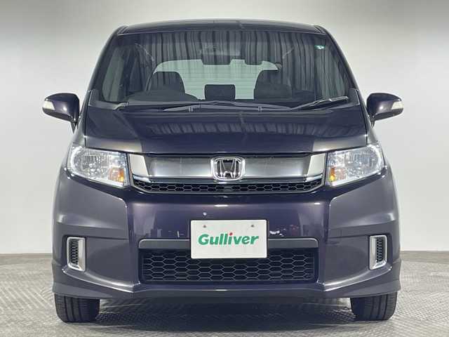 ホンダ フリード スパイク ハイブリット プレミアムエディション 神奈川県 2015(平27)年 5.2万km パープル 両側パワースライドドア/純正7インチナビゲーション/フルセグ　Bluetooth　CD　DVD　iPod　HDMI　MusicRack　SD　AUX　VTR/純正エアロ（サイド　リアスポイラー）/バックカメラ/クルーズコントロール/ビルトインＥＴＣ/純正前方ドライブレコーダー/純正フロアマット/ステアリングスイッチ　/プラズマクラスター付きオートエアコン/ＥＣＯＮ/ＨＩＤヘッドライト/オートライト/純正ドアバザー/スマートキー/スペアキー/取扱説明書