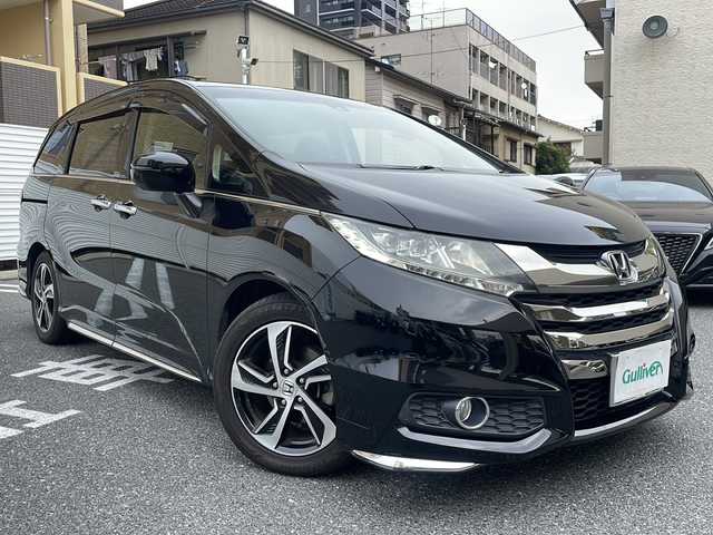 ホンダ オデッセイ アブソルート・Xホンダセンジング 広島県 2017(平29)年 6.8万km クリスタルブラックパール /登録時走行距離/　　　　　　　67602キロ/アイドリングストップ/純正ナビ/バックカメラ/地デジ/ハーフレザーシート/クルーズコントロール/両側パワースライドドア/社外フリップダウンモニター/　　【TVM-FW1020】/ビルトインETC/新車時整備手帳/　　【保証書】/取扱説明書/