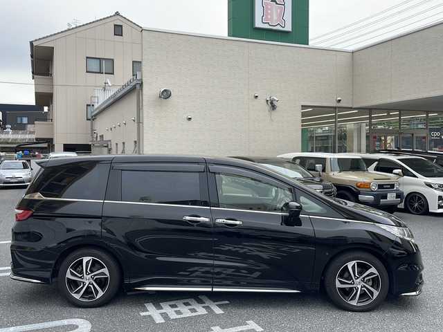 ホンダ オデッセイ アブソルート・Xホンダセンジング 広島県 2017(平29)年 6.8万km クリスタルブラックパール /登録時走行距離/　　　　　　　67602キロ/アイドリングストップ/純正ナビ/バックカメラ/地デジ/ハーフレザーシート/クルーズコントロール/両側パワースライドドア/社外フリップダウンモニター/　　【TVM-FW1020】/ビルトインETC/新車時整備手帳/　　【保証書】/取扱説明書/