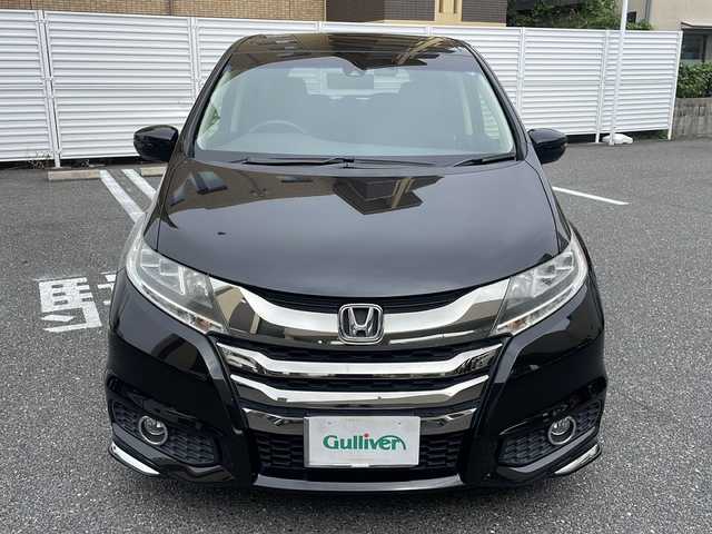 ホンダ オデッセイ アブソルート・Xホンダセンジング 広島県 2017(平29)年 6.8万km クリスタルブラックパール /登録時走行距離/　　　　　　　67602キロ/アイドリングストップ/純正ナビ/バックカメラ/地デジ/ハーフレザーシート/クルーズコントロール/両側パワースライドドア/社外フリップダウンモニター/　　【TVM-FW1020】/ビルトインETC/新車時整備手帳/　　【保証書】/取扱説明書/