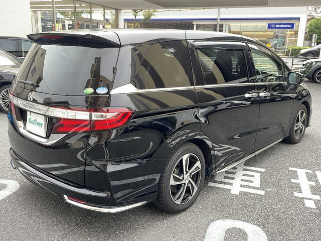 ホンダ オデッセイ アブソルート・Xホンダセンジング 広島県 2017(平29)年 6.8万km クリスタルブラックパール /登録時走行距離/　　　　　　　67602キロ/アイドリングストップ/純正ナビ/バックカメラ/地デジ/ハーフレザーシート/クルーズコントロール/両側パワースライドドア/社外フリップダウンモニター/　　【TVM-FW1020】/ビルトインETC/新車時整備手帳/　　【保証書】/取扱説明書/