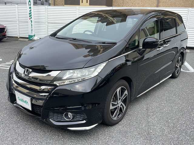 ホンダ オデッセイ アブソルート・Xホンダセンジング 広島県 2017(平29)年 6.8万km クリスタルブラックパール /登録時走行距離/　　　　　　　67602キロ/アイドリングストップ/純正ナビ/バックカメラ/地デジ/ハーフレザーシート/クルーズコントロール/両側パワースライドドア/社外フリップダウンモニター/　　【TVM-FW1020】/ビルトインETC/新車時整備手帳/　　【保証書】/取扱説明書/