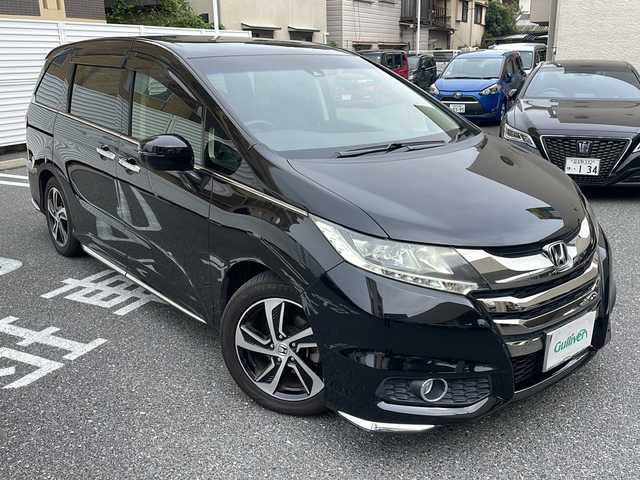 ホンダ オデッセイ アブソルート・Xホンダセンジング 広島県 2017(平29)年 6.8万km クリスタルブラックパール /登録時走行距離/　　　　　　　67602キロ/アイドリングストップ/純正ナビ/バックカメラ/地デジ/ハーフレザーシート/クルーズコントロール/両側パワースライドドア/社外フリップダウンモニター/　　【TVM-FW1020】/ビルトインETC/新車時整備手帳/　　【保証書】/取扱説明書/