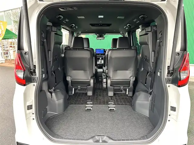 トヨタ ノア ハイブリッド S－Z 宮城県 2024(令6)年 0.2万km ホワイトパールクリスタルシャイン 快適利便パッケージHigh/・ハンズフリーパワースライドドア/・パワーバックドア/・ナノイーX/・ステアリングヒーター/・シートヒーター/・オットマン/・角度調整付アームレスト/トヨタチームメイト/・アドバンストパーク/・パーキングサポートブレーキ（周囲静止物/後方歩行者）/・パノラミックビューモニター/・エレクトロシフトマチック/プロジェクター式LEDヘッドランプ/デイライト/アダプティブハイビーム/ドライビングサポートパッケージ/・カラーヘッドアップディスプレイ/・デジタルインナーミラー/ディスプレイオーディオプラス/・コネクティッドナビ対応10.5インチディスプレイ/・車載メモリーナビ/・CD/DVD/・地デジTV/・USB/HDMI/・AppleCarPlay/AndroidAuto/・ETC2.0/＝＝＝/セーフティセンス/・プリクラッシュセーフティ/・レーントレーシングアシスト/・レーダークルーズコントロール/・オートマチックハイビーム/・ロードサインアシスト/・ドライバー異常時対応システム/・プロアクティブドライビングアシスト/両側パワースライドドア/AC100V1500W