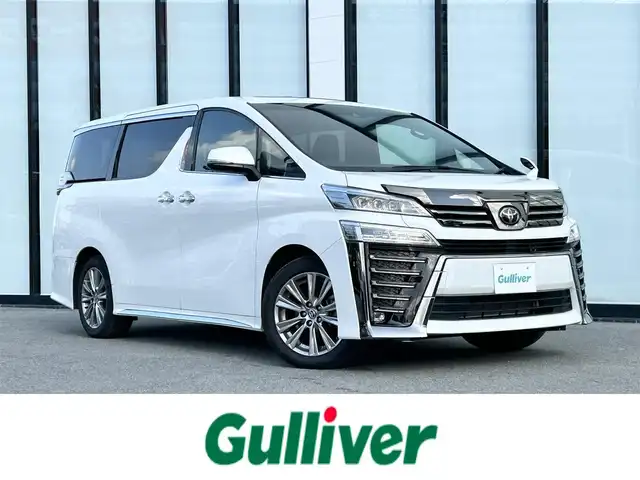 トヨタ ヴェルファイア ゴールデンアイズⅢ 大阪府 2022(令4)年 3.2万km ホワイトパールクリスタルシャイン トヨタセーフティセンス/純正9インチディスプレイオーディオナビ/バックカメラ/両側パワースライドドア/ビルトインETC/パワーバックドア/オットマン/ツインムーンルーフ/デジタルインナーミラー/BSM/ハーフレザーシート/3眼LEDヘッド/シーケンシャルターンランプ/スペアタイヤ/純正18インチAW