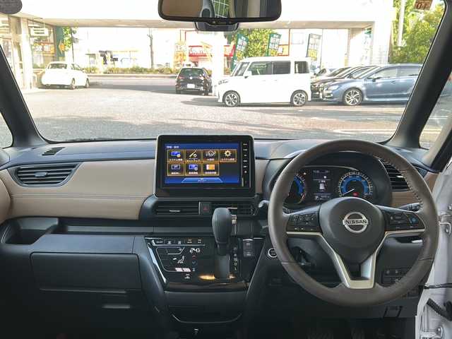 日産 ルークス HWS X プロパイロットED 埼玉県 2022(令4)年 1.7万km ホワイトパール ワンオーナー　/純正９型DA　/プロパイロット　/全方位カメラ　/TRC/衝突軽減B/コーナーセンサー　/電格ミラー　/USBソケット　/サンシェード　/パーソナルテーブル　/LEDオートライト　/保証書　/取説/OPブラウン×トリコット合皮/純正15インチAW