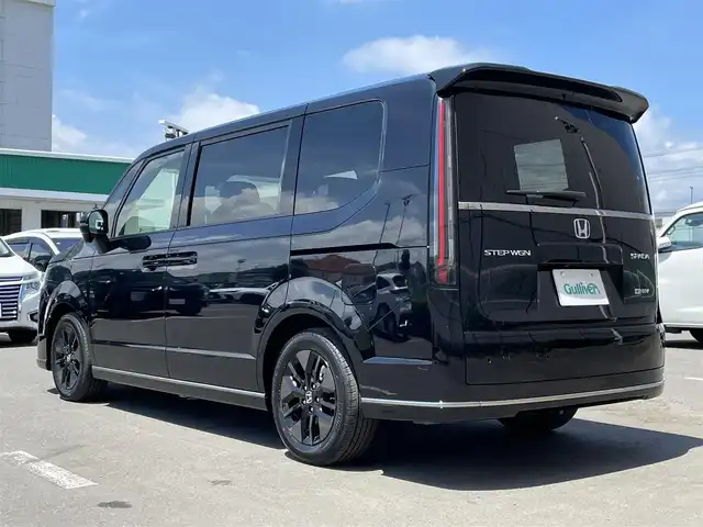 ホンダ ステップワゴン スパーダ eHEV 東京都 2025(令7)年 0.1万km未満 クリスタルブラックパール 純正ナビ/バックモニター/衝突軽減ブレーキ/路外逸脱抑制/ブラインドスポット/パーキングセンサー/レーダークルーズ/シートヒーター/両側電動スライドドア/電動リアゲート/ステアリングスイッチ