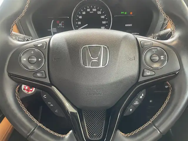 ホンダ ヴェゼル ハイブリッド Z ホンダセンシング 兵庫県 2020(令2)年 3.2万km プラチナホワイトパール ・ワンオーナー/・新車設定　キャメル内装/・純正メモリーナビ（VXM-214VFi）/・地デジ/DVD/BT/USB/・バックカメラ/・ステアリングリモコン/・ビルトインETC/・パドルシフト/・ハーフレザーシート（前席シートヒーター）/・プラズマクラスター搭載エアコン/・ドライブレコーダー/・ルーフレール/・アダプティブクルーズコントロール/・CMBS警告/・先行車発進お知らせ/・路外逸脱抑制制御/・レーンキープアシストシステム/・標識認識機能