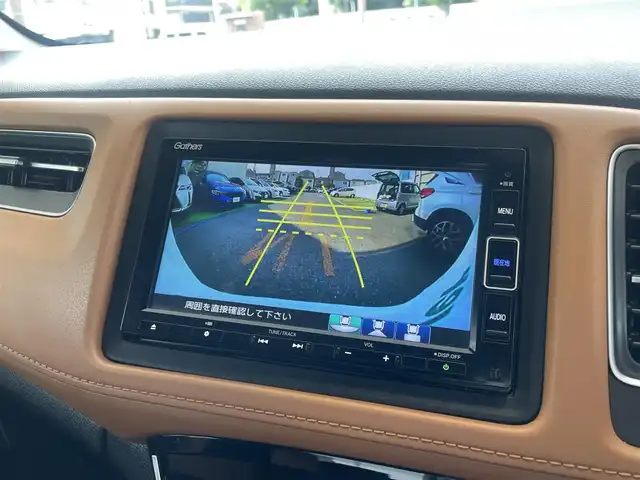 ホンダ ヴェゼル ハイブリッド Z ホンダセンシング 兵庫県 2020(令2)年 3.2万km プラチナホワイトパール ・ワンオーナー/・新車設定　キャメル内装/・純正メモリーナビ（VXM-214VFi）/・地デジ/DVD/BT/USB/・バックカメラ/・ステアリングリモコン/・ビルトインETC/・パドルシフト/・ハーフレザーシート（前席シートヒーター）/・プラズマクラスター搭載エアコン/・ドライブレコーダー/・ルーフレール/・アダプティブクルーズコントロール/・CMBS警告/・先行車発進お知らせ/・路外逸脱抑制制御/・レーンキープアシストシステム/・標識認識機能